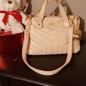 Light Blush colored xoxo purse